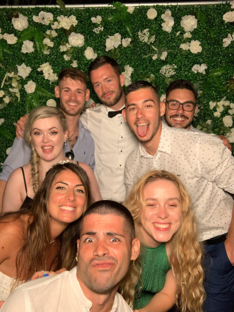 Flower wall, neon and selfie pod photo